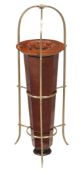 An Arts and Crafts mahogany and brass bound stick stand , late 19th century, with apertures for