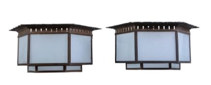 A pair of Art Deco hexagonal ceiling lights, 1930s, patinated bronze and frosted glass, six