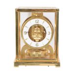 A gilt brass 'Atmos' timepiece, Jaeger-LeCoultre, second half 20th century, the single train