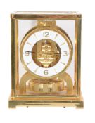 A gilt brass 'Atmos' timepiece, Jaeger-LeCoultre, second half 20th century, the single train