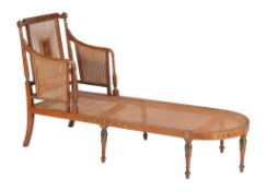 A Sheraton Revival satinwood and painted day bed, circa 1900, the chair back to one short end with