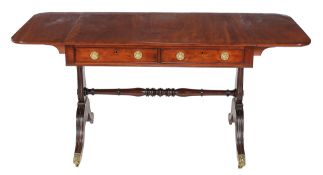 A George III mahogany sofa table , circa 1810, with two short frieze drawers to one long end, 73cm