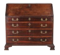 Ω A George III rosewood and padouk bureau , second half 18th century, the fall opening to an