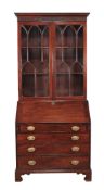 A mahogany and glazed bureau bookcase, containing associated 18th century elements, the glazed