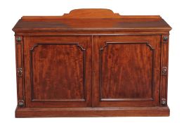 A Victorian mahogany side cabinet , circa 1860, with a pair of cupboard doors enclosing a