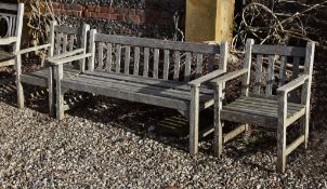 A teak garden bench, late 20th century, with slatted back and seat, 79cm high, 158cm wide; and a