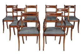 A set of eight Regency mahogany dining chairs, early 19th century, to include a pair of armchairs