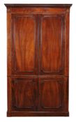 A George III mahogany wardrobe , circa 1800, possibly Channel Islands, 194cm high, 121cm wide, 51cm