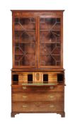 A mahogany secretaire bookcase , incorporating associated George III elements, the secretaire