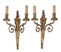 A pair of gilt bronze twin light wall appliques in Louis XV style, 20th century, the backplates