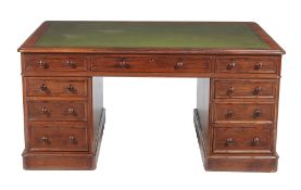 A Victorian mahogany twin pedestal partner's desk , circa 1860, the leather inset top with three