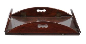 A George III mahogany butler's tray , late 18th century, of small proportion, with hinged handles,
