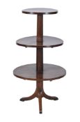 A Continental walnut three tier whatnot , mid 19th century, 117cm high, 64cm diameter at the widest