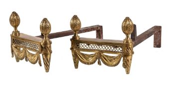 A pair of French gilt bronze and wrought iron mounted chenets in Louis XVI style, second half 19th