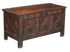 An oak three panel coffer , 17th century and later, 60cm high, 118cm wide, 51cm deep