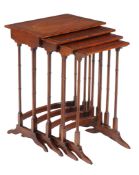 A nest of mahogany and feather banded quartetto tables , 19th century, the largest 70cm high, 50cm
