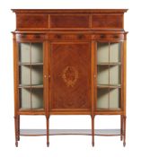 An Edwardian mahogany and inlaid display cabinet , circa 1905, of double bowfront outline, 165cm