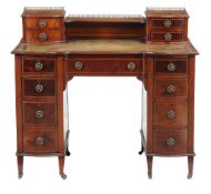 An Edwardian mahogany and line inlaid desk , circa 1905, of serpentine outline, 97cm high, 107cm