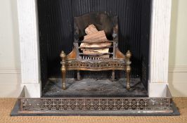 A George III steel, cast iron and brass mounted firegrate , late 18th century, the arched backplate