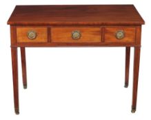 A George III mahogany side table, circa 1790, the rectangular top above three frieze drawers, on