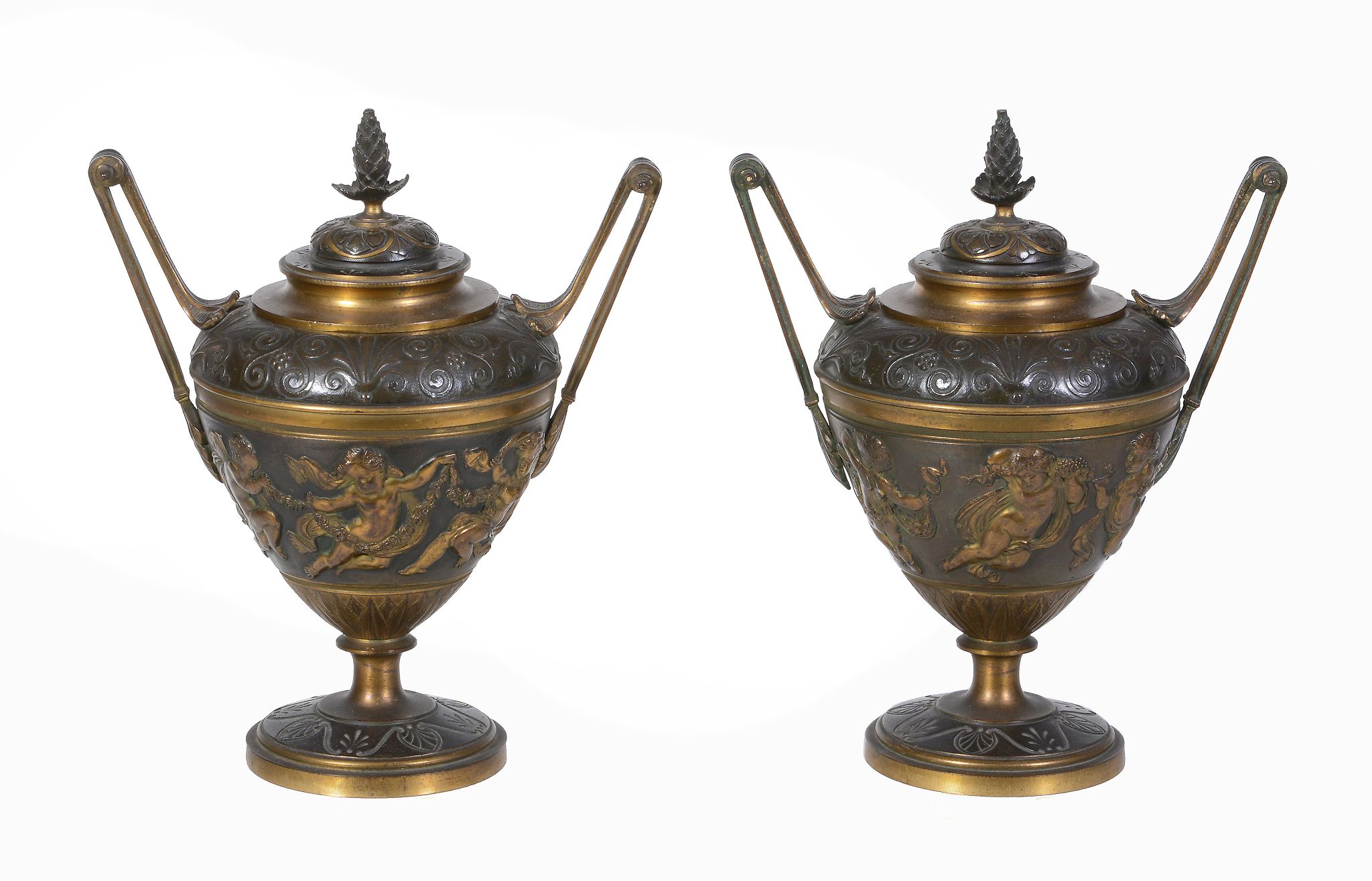 A pair of Continental parcel gilt and patinated bronze twin handled urns and covers in Neoclassical