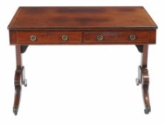 Ω A Regency mahogany and rosewood banded library table , circa 1820, with two short drawers to