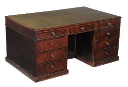 A George III mahogany pedestal desk, circa 1780, the moulded rectangular top with tooled leather