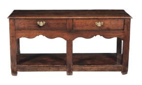 An oak dresser base, 19th century, with two frieze drawers, 77cm high, 148cm wide, 42cm deep