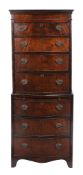 A George III mahogany chest on chest , circa 1800, of bowfront outline and narrow proportion, 156cm