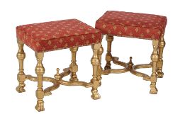 A pair of gilt stools in early 18th century style , second half 20th century, 54cm high, the seat