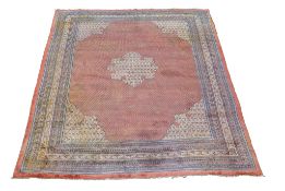 A Saraband carpet, approximately 563cm x 367cm Provenance: From the collection of the late John