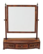 A George III mahogany and line inlaid platform dressing mirror , circa 1800, of bowfront outline,