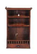 A walnut wall hanging spice rack, early 19th century, 80cm high, 47cm wide, 22cm deep