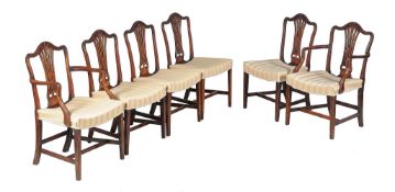 A set of six George III mahogany dining chairs , late 18th century, to include two armchairs