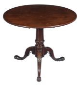 A George III mahogany birdcage tripod supper table , circa 1760, the circular top above the