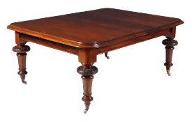 A Victorian mahogany extending dining table , circa 1860, with two additional leaf insertions, the