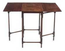 A Regency mahogany spider leg table , circa 1815, with the rectangular top with two drop leaves