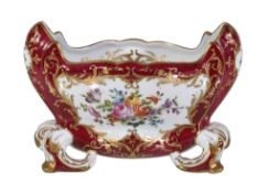 A modern Limoges porcelain Sevres-style jardiniere, painted with panels of flowers reserved on a