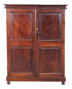 Ω A solid rosewood secretaire cabinet , 19th century, Anglo-Indian, the pair of panel doors