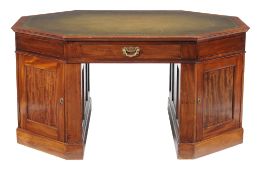 A mahogany twin pedestal partner's desk , 19th century, of octagonal outline, each pedestal with