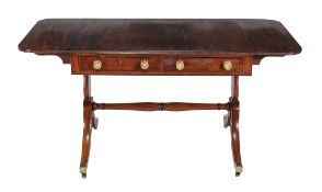 Ω A Regency mahogany and ebony strung sofa table, circa 1815, with two short drawers to one long