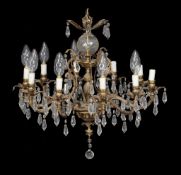 A gilt bronze and glass hung ten light chandelier, 20th century, the electrical fitments in urn