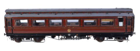 An early model of a 3 Â½ inch gauge LMS 1st class passenger coach, with fitted interior and many