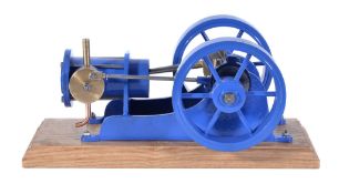 A well-engineered freelance model of a single acting horizontal live steam mill engine, built by Mr