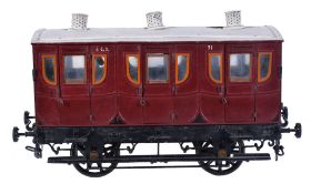 A rare model of a 19th century 4 Â¾ inch gauge railway coach, with original fitted interior having