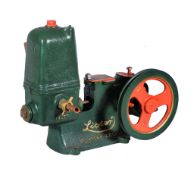 A full size working water pump by Lister of Dursley, being belt driven .500 rpm. Type 18 with brass