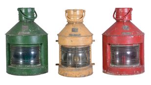 A collection of three painted ships lamps, Port, Starboard and Masthead.
