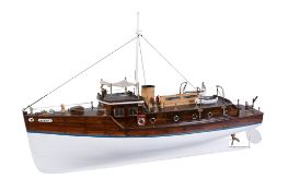 An early model of a steam boat, of wooden construction with simulated plank decking having brass