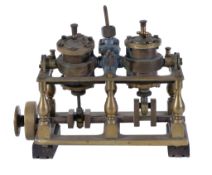 A late 19th Century model marine twin cylinder vertical oscillating screw engine, the cylinders 1