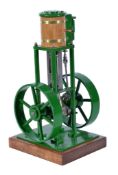 A model of a vertical live steam stationary engine, built by Mr D Russell of Frazerburgh. The